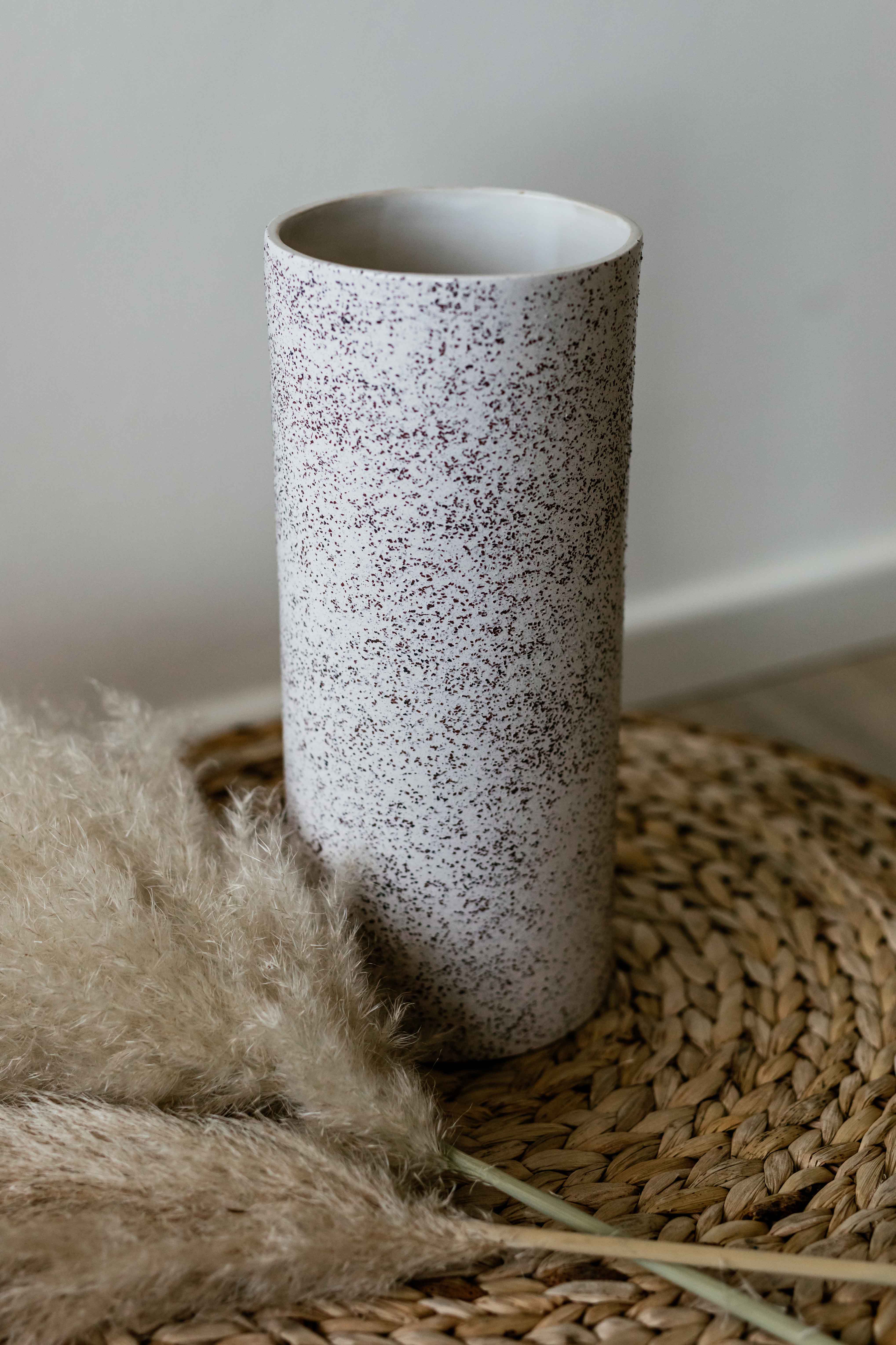 Tall white-black textured tube vase