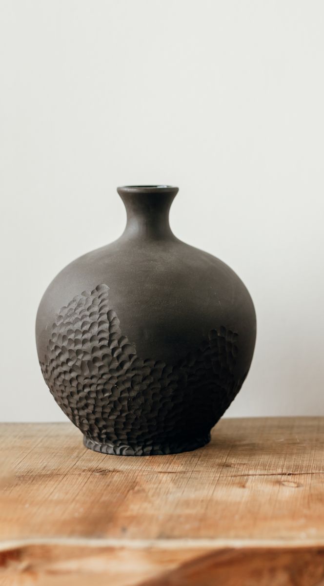 Olive black carved vase